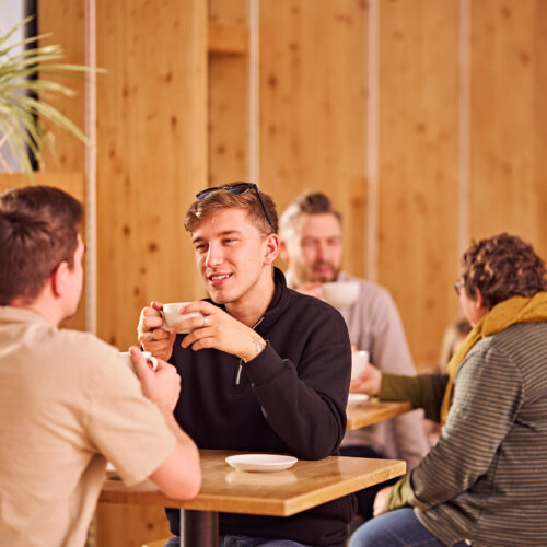 People in a cafe chatting
